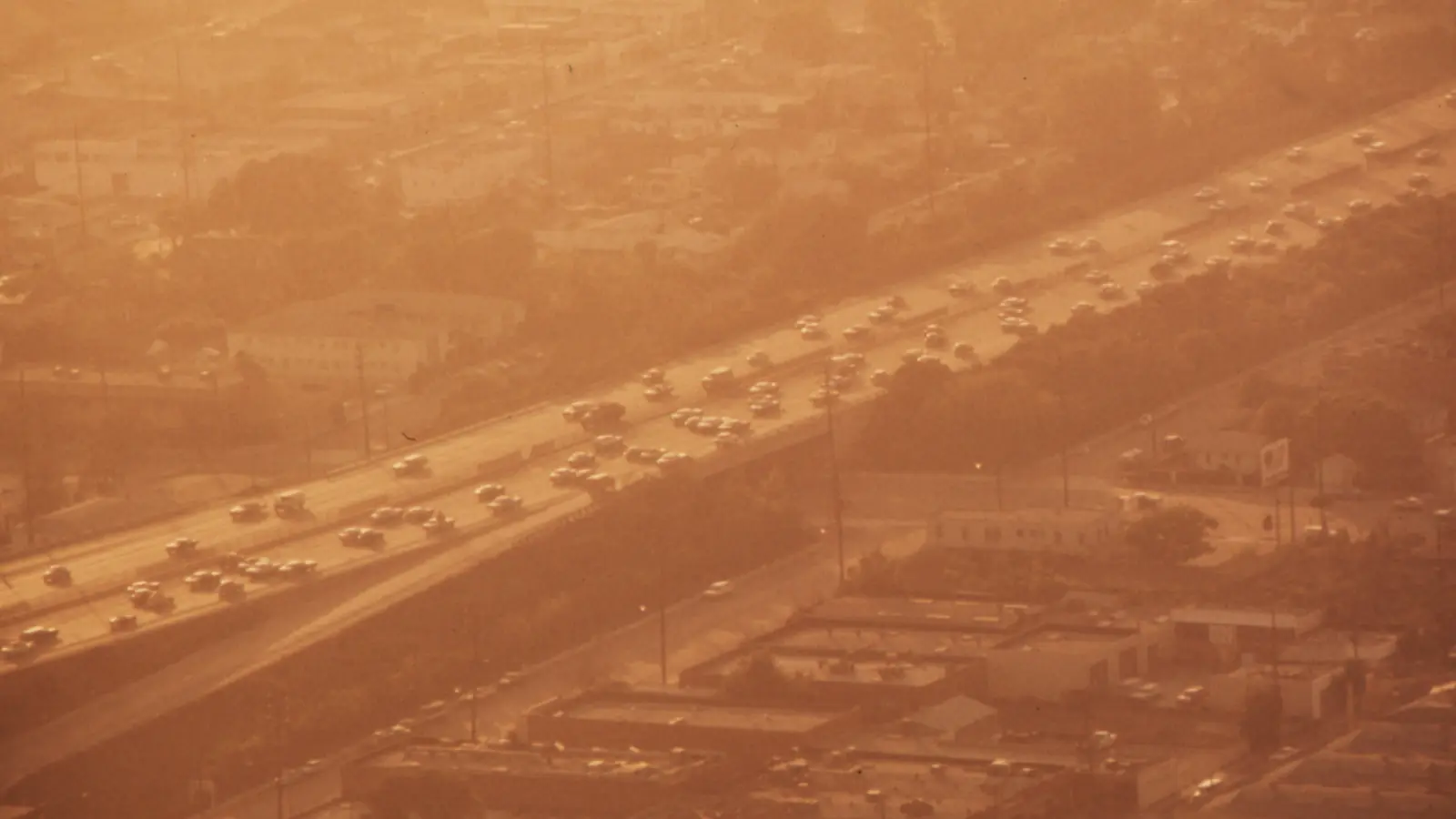 Traffic on a Los Angeles freeway under a brown smog layer, 1972